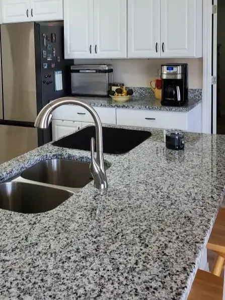 Luna Pearl granite kitchen countertop and sink