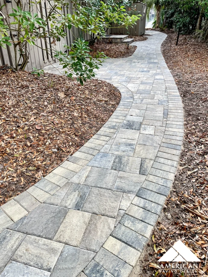 American Paving Design, featuring a multi-tone gray and tan concrete finish